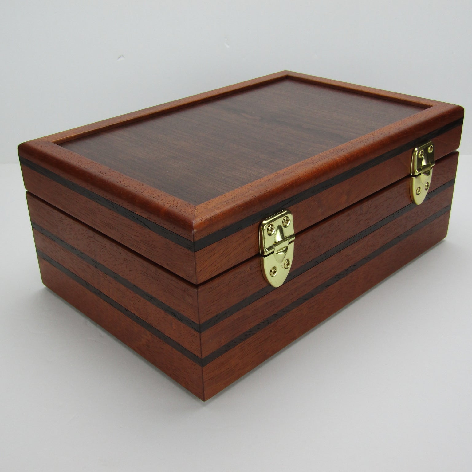 Back view of valet box for men handcrafted from mahogany, with wenge inlay and a dark finished cherry veneer lid  by A Finer Cut Woodworking.