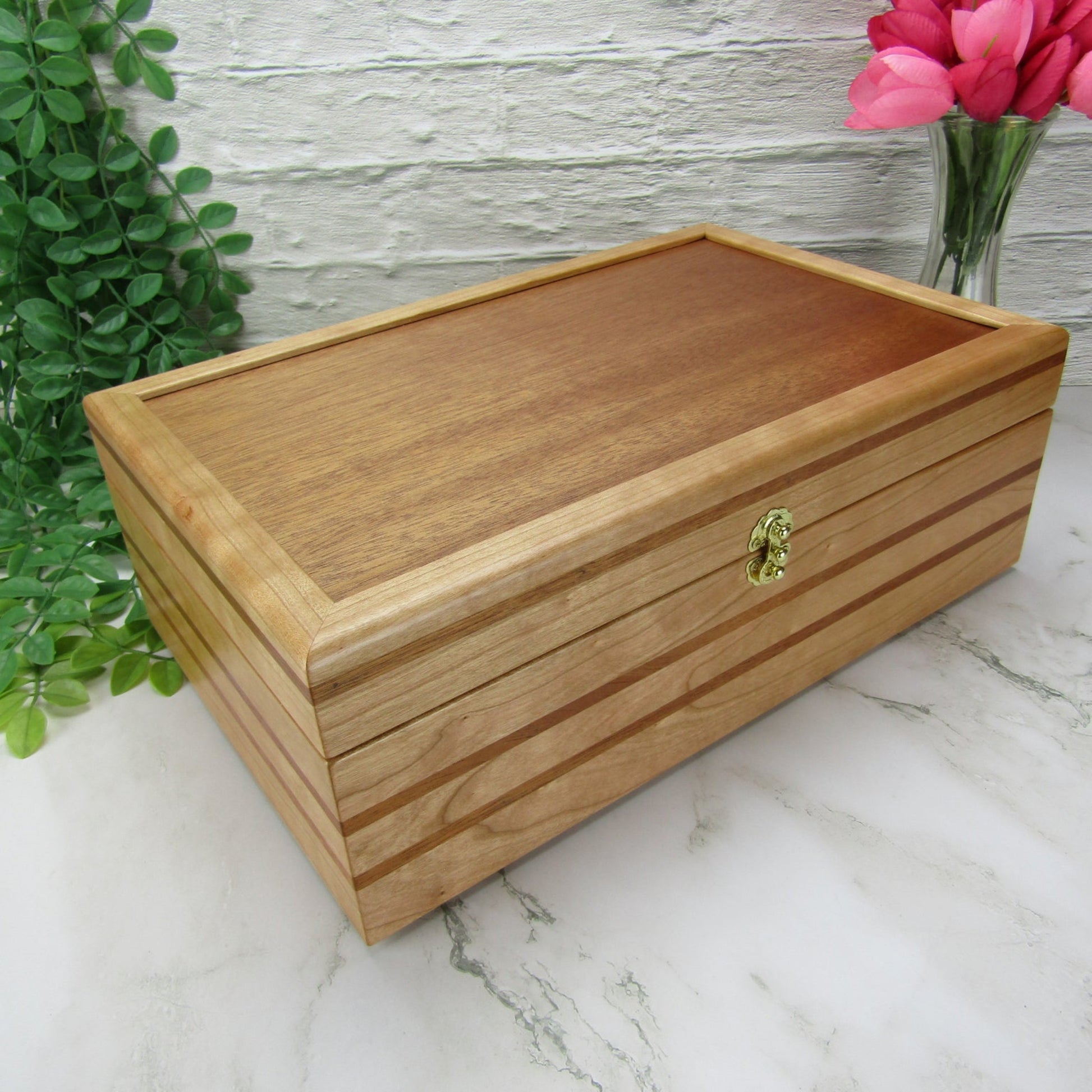 Thumbnail of wooden keepsake box handmade from domestic cherry and mahogany wood by A Finer Cut Woodworking.