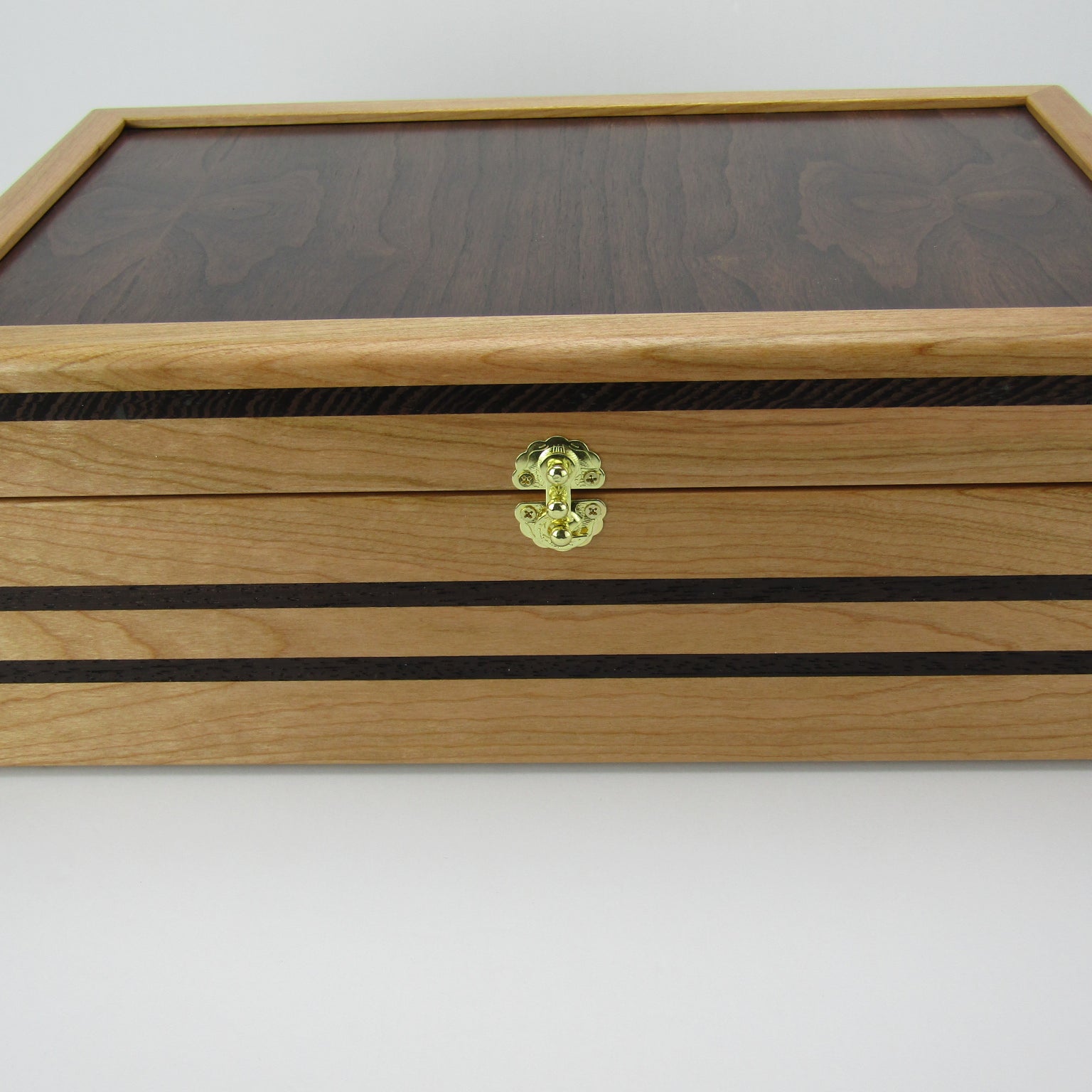 >Front view of wooden keepsake box handmade from cherry, wenge, and dark finished cherry veneer by A Finer Cut Woodworking.