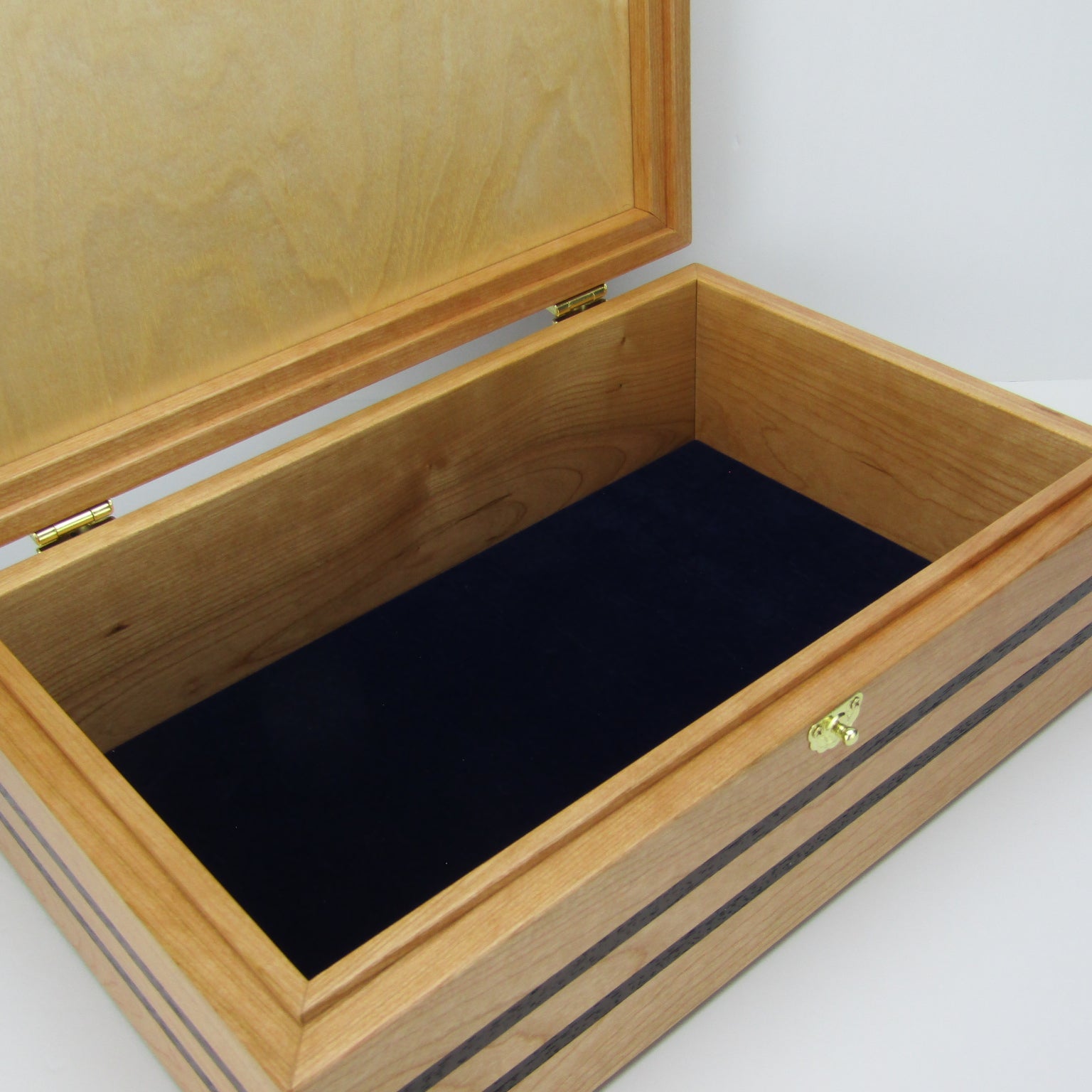 >Interior view of wooden keepsake box handmade from cherry, wenge, and dark finished cherry veneer by A Finer Cut Woodworking.