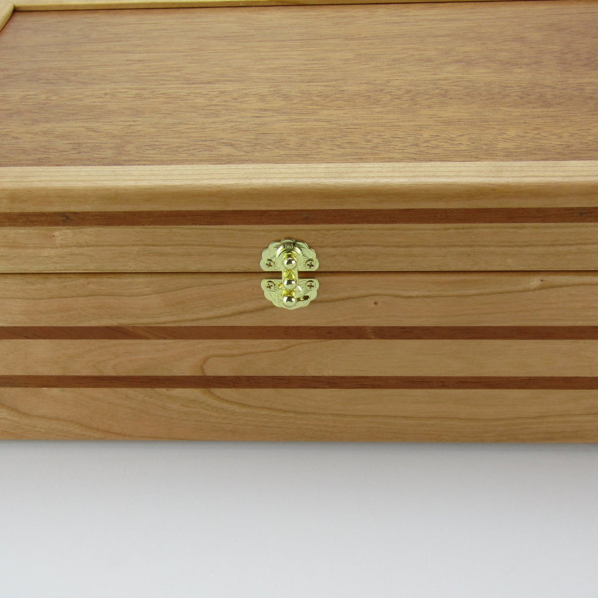 Front view of wooden keepsake box handmade from domestic cherry and mahogany wood by A Finer Cut Woodworking.