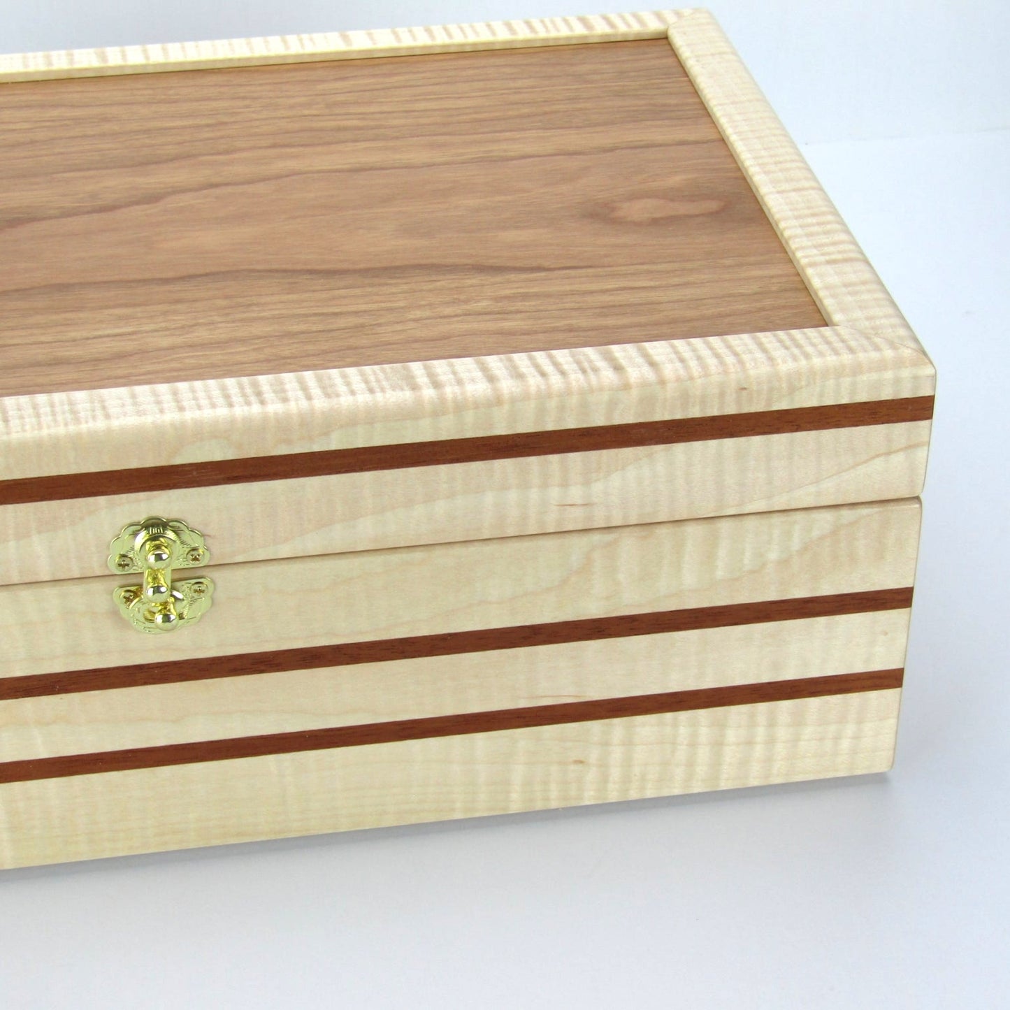Front view of wooden keepsake box handmade from curly maple, mahogany, and cherry veneer by A Finer Cut Woodworking.