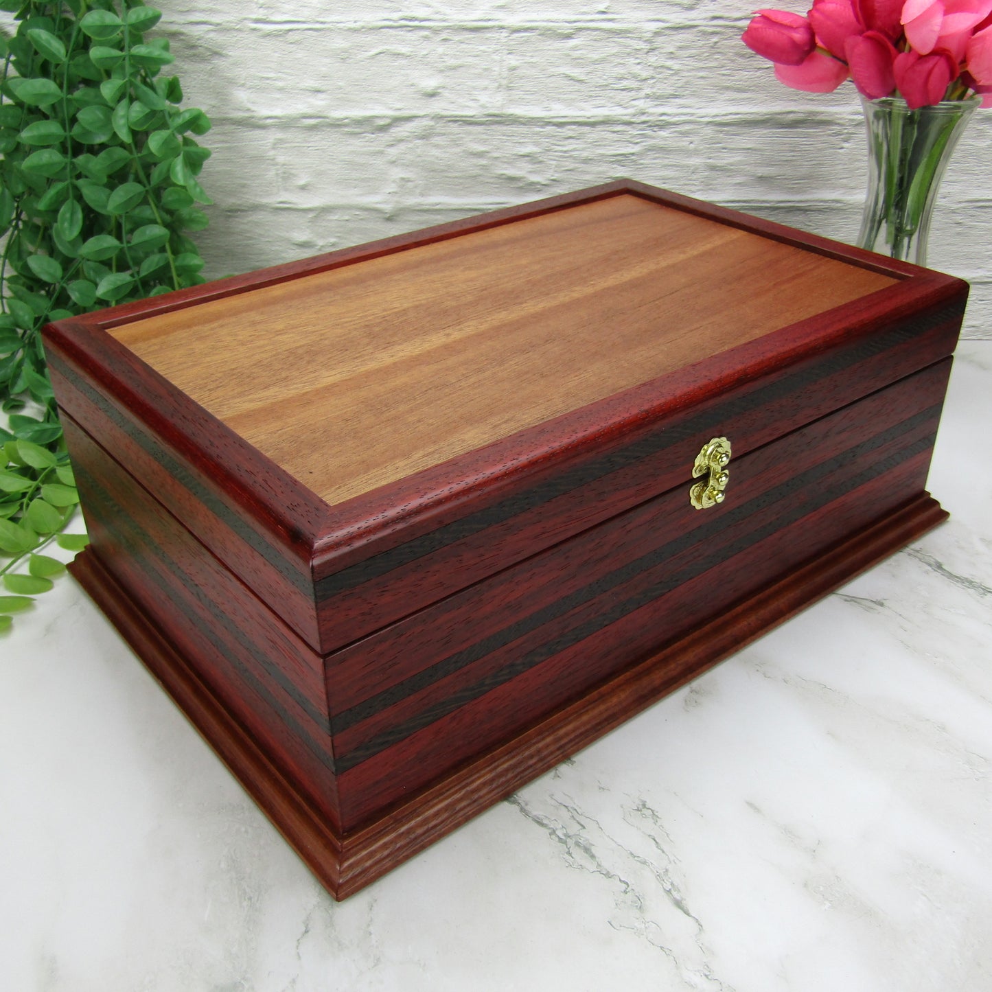 Thumbnail of wooden keepsake box handmade from padauk, wenge, and cherry veneer by A Finer Cut Woodworking.