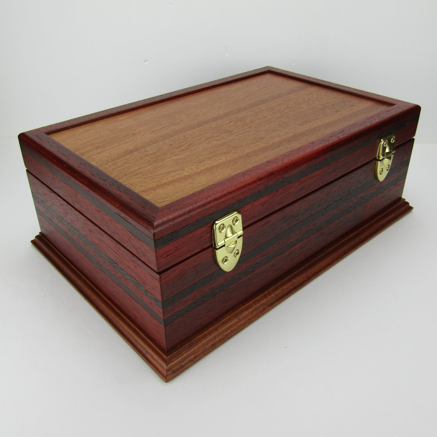 Back view of wooden keepsake box handmade from padauk, wenge, and cherry veneer by A Finer Cut Woodworking.