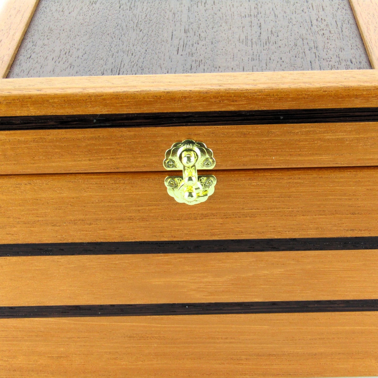 Inlays on small wooden memory box handmade from mahogany, wenge and Peruvian walnut by A Finer Cut.